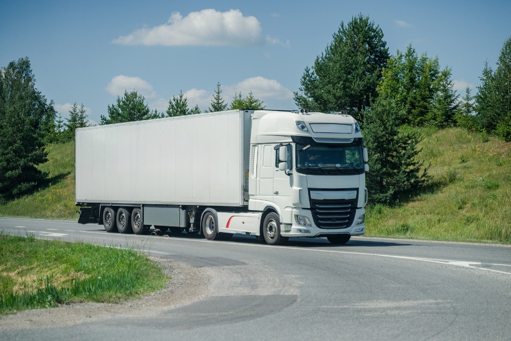 Truck and trailer on a road