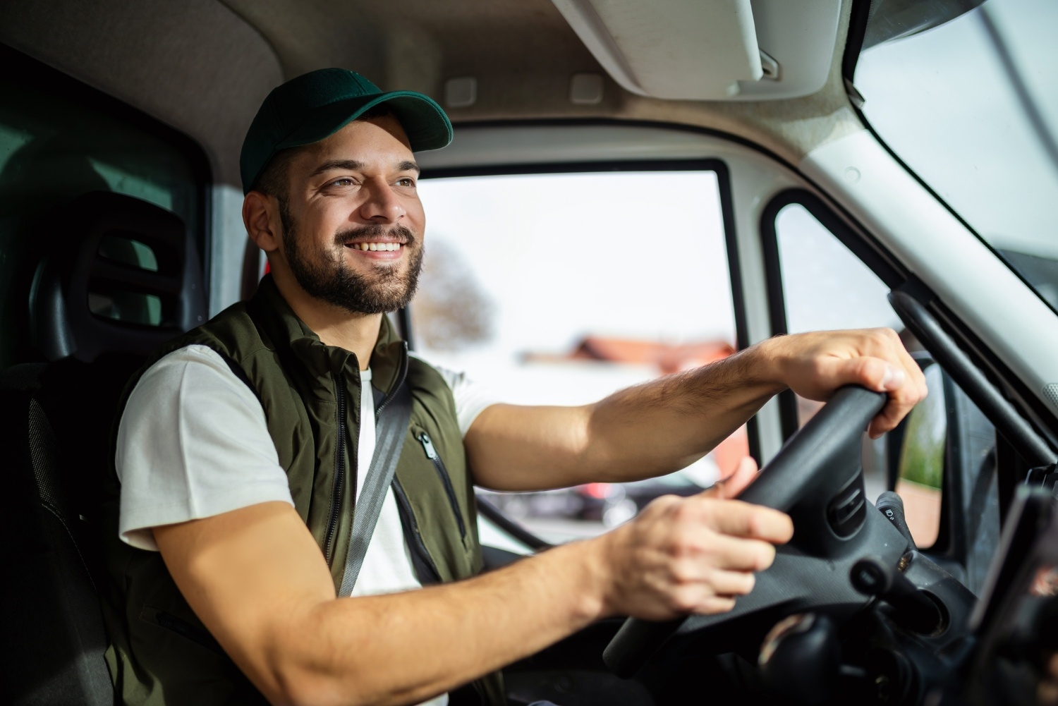 smiling fleet driver with cap