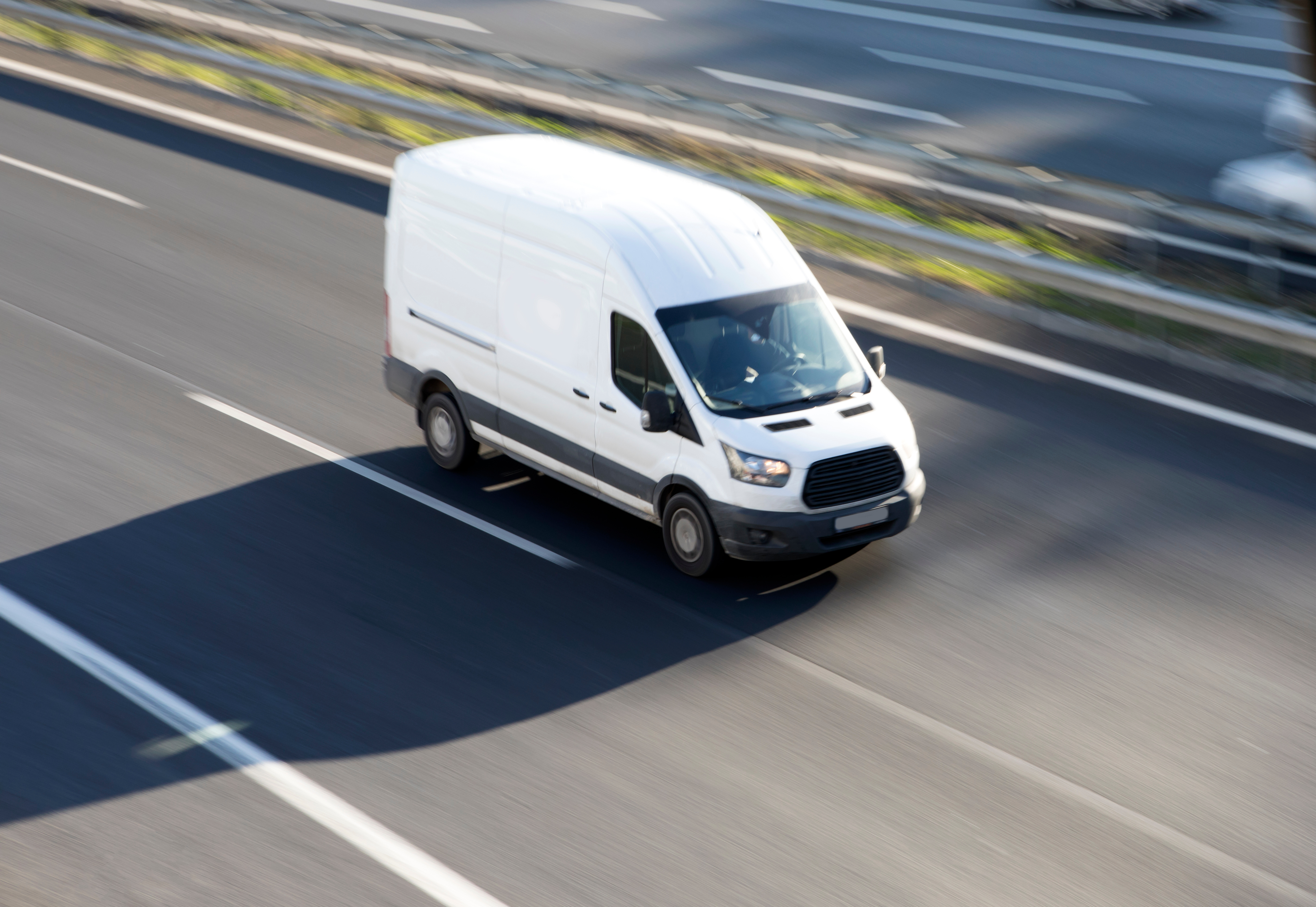 van-travelling-road